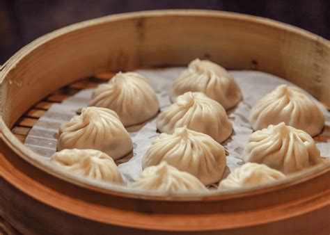 Place dumplings in lined steamer basket. . Xiao long bao near me